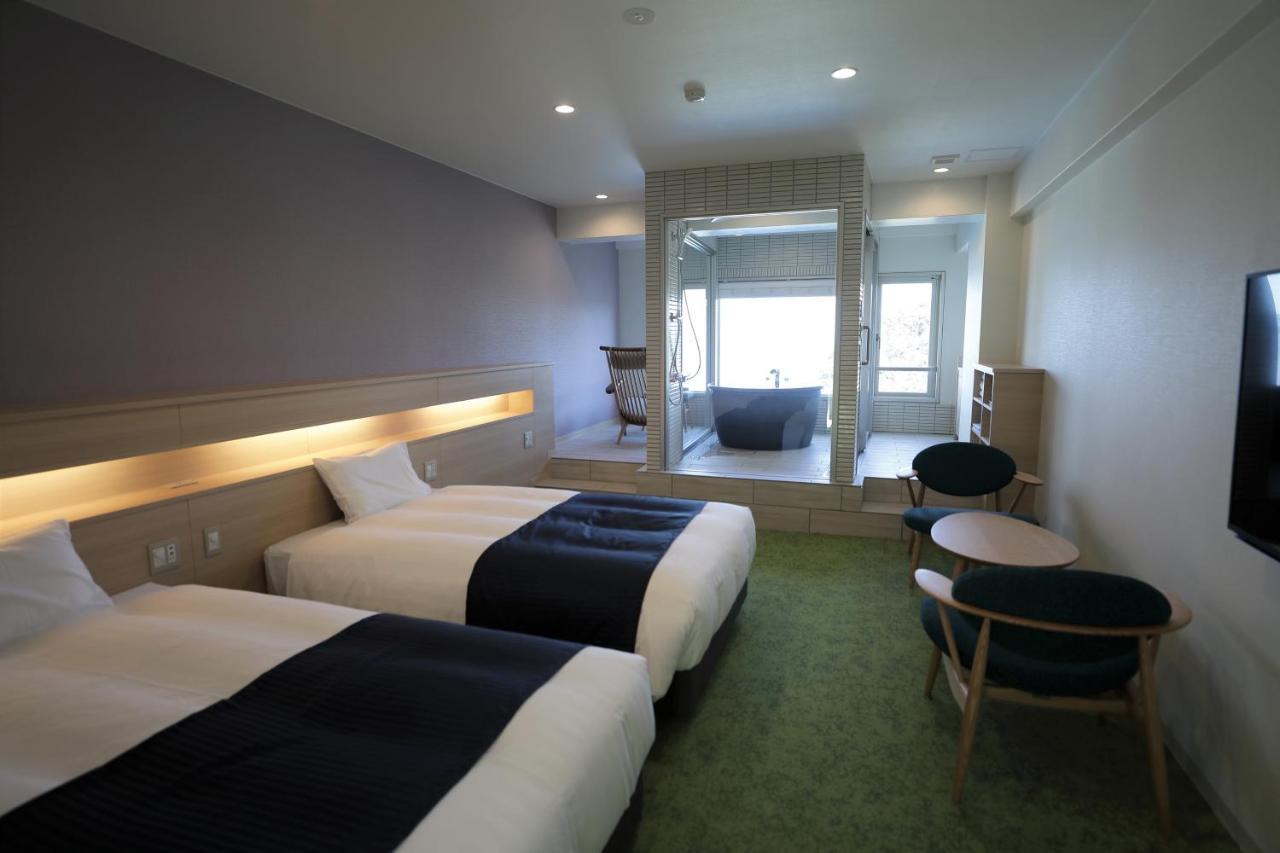 Hotel Izukyu Шідзуока Номер фото